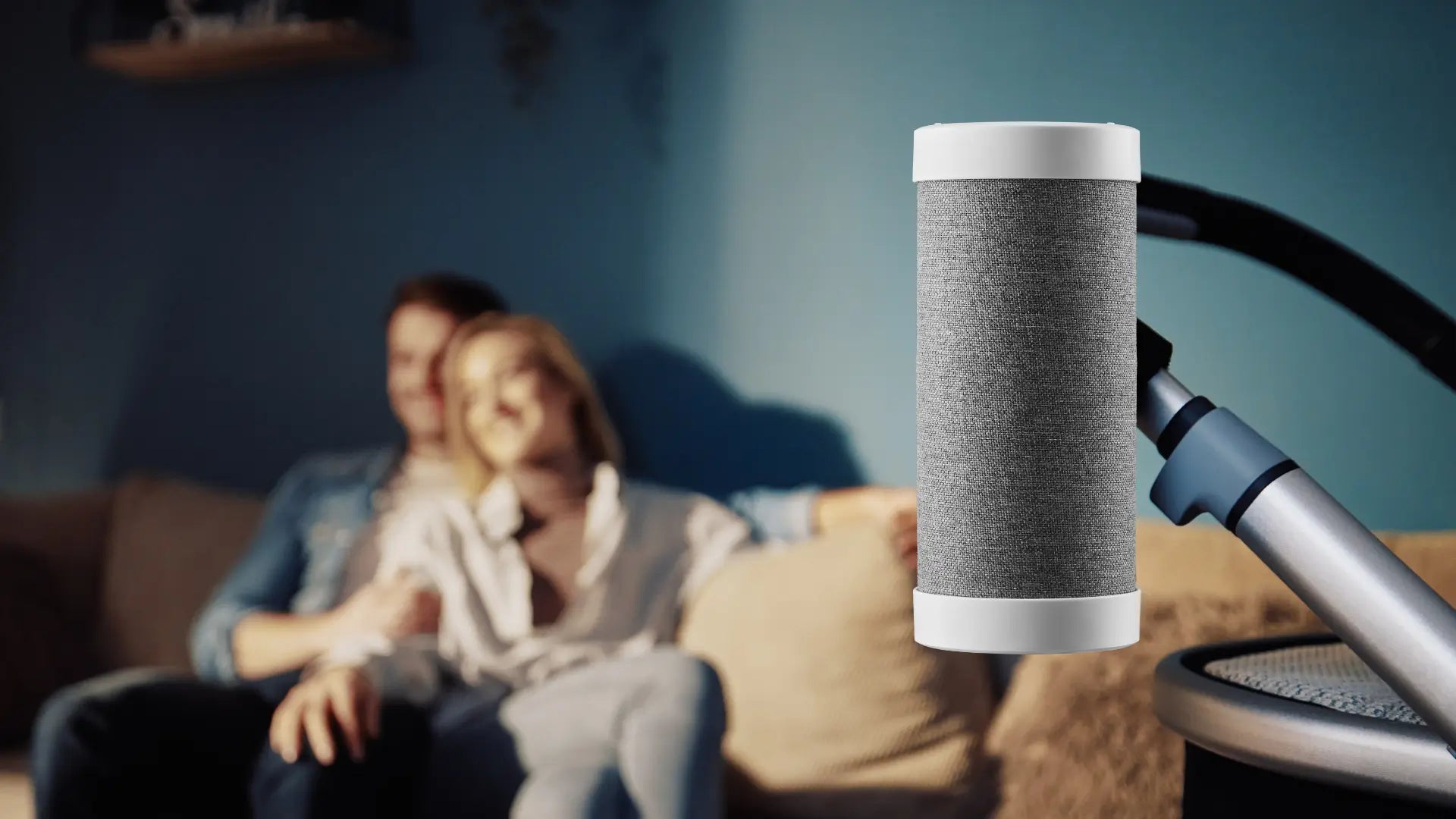 Parents relaxing on a couch while RockingRide quietly rocks the baby stroller nearby.